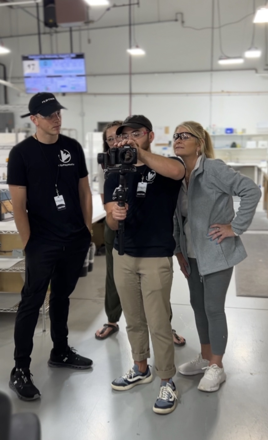 ClipPlayMedia crew filming on a client floor